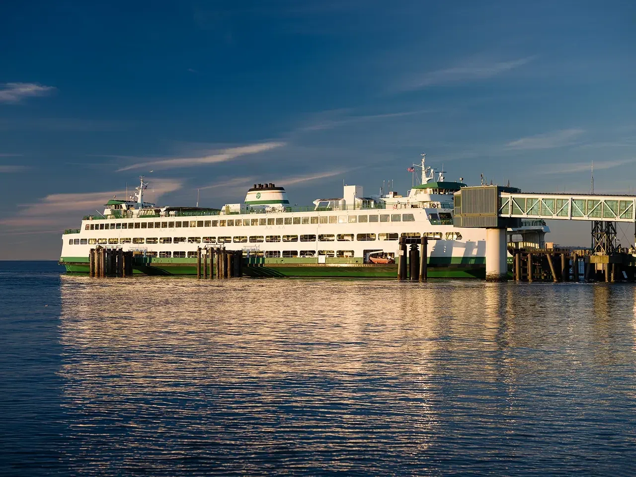 Washington State ferry docked at the Edmonds terminal at golden hour