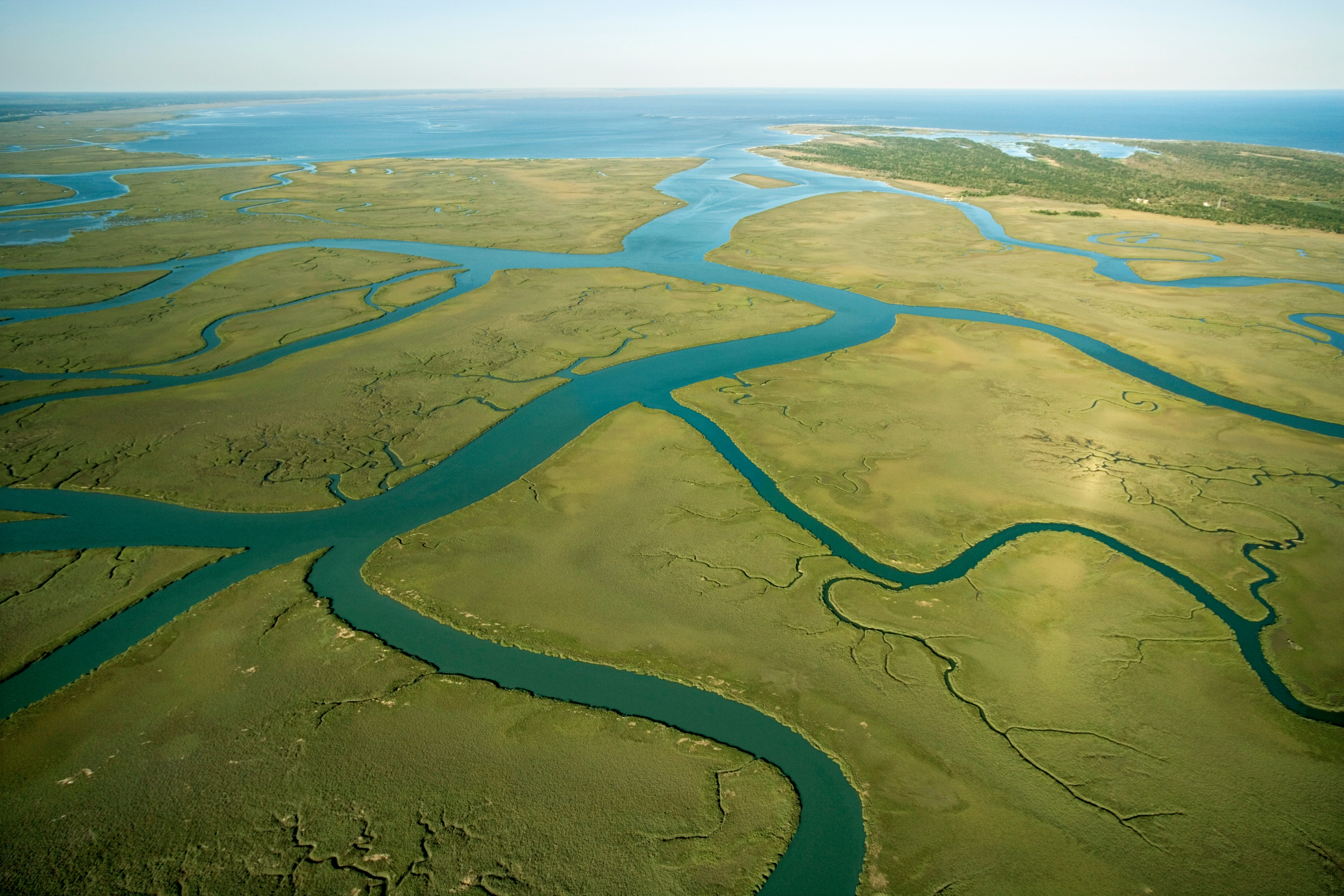 Aerial view of a watershed river system draining to the coast